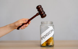 Bank of coins Pension and gavel. Legal disputes or claims involving pension benefits for Teachers